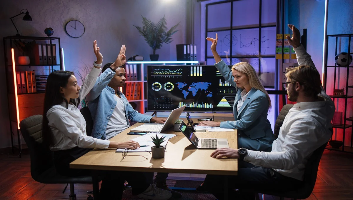 Voozon platform review, features, and digital business tools discussed by a professional team in a meeting.