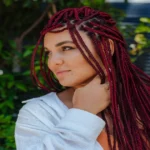 Braided wig with knotless box braids in dark brown color