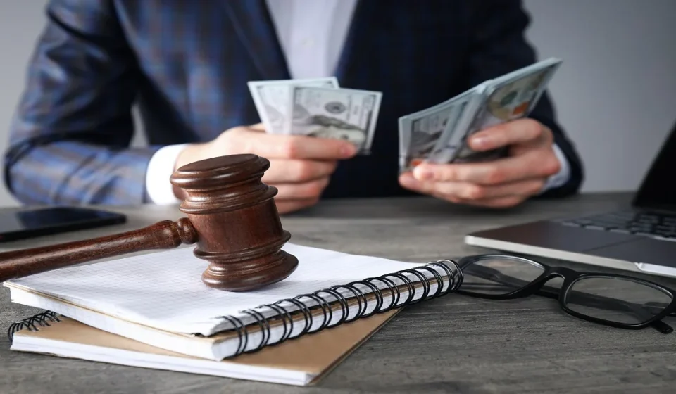 Business lawyer consulting with a client about legal contracts and business compliance