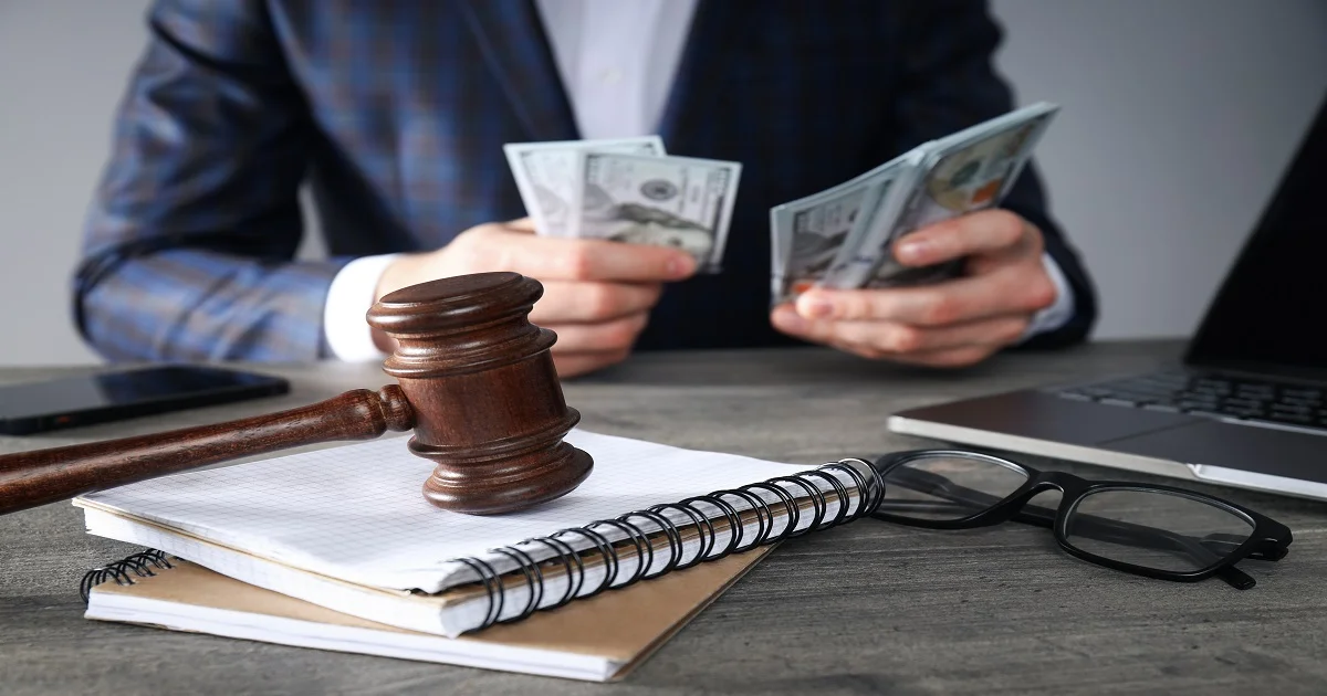 Business lawyer consulting with a client about legal contracts and business compliance