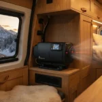 Modern diesel air heater installed in a camper van with a digital controller, showcasing efficient heating, proper installation, and safe operation.